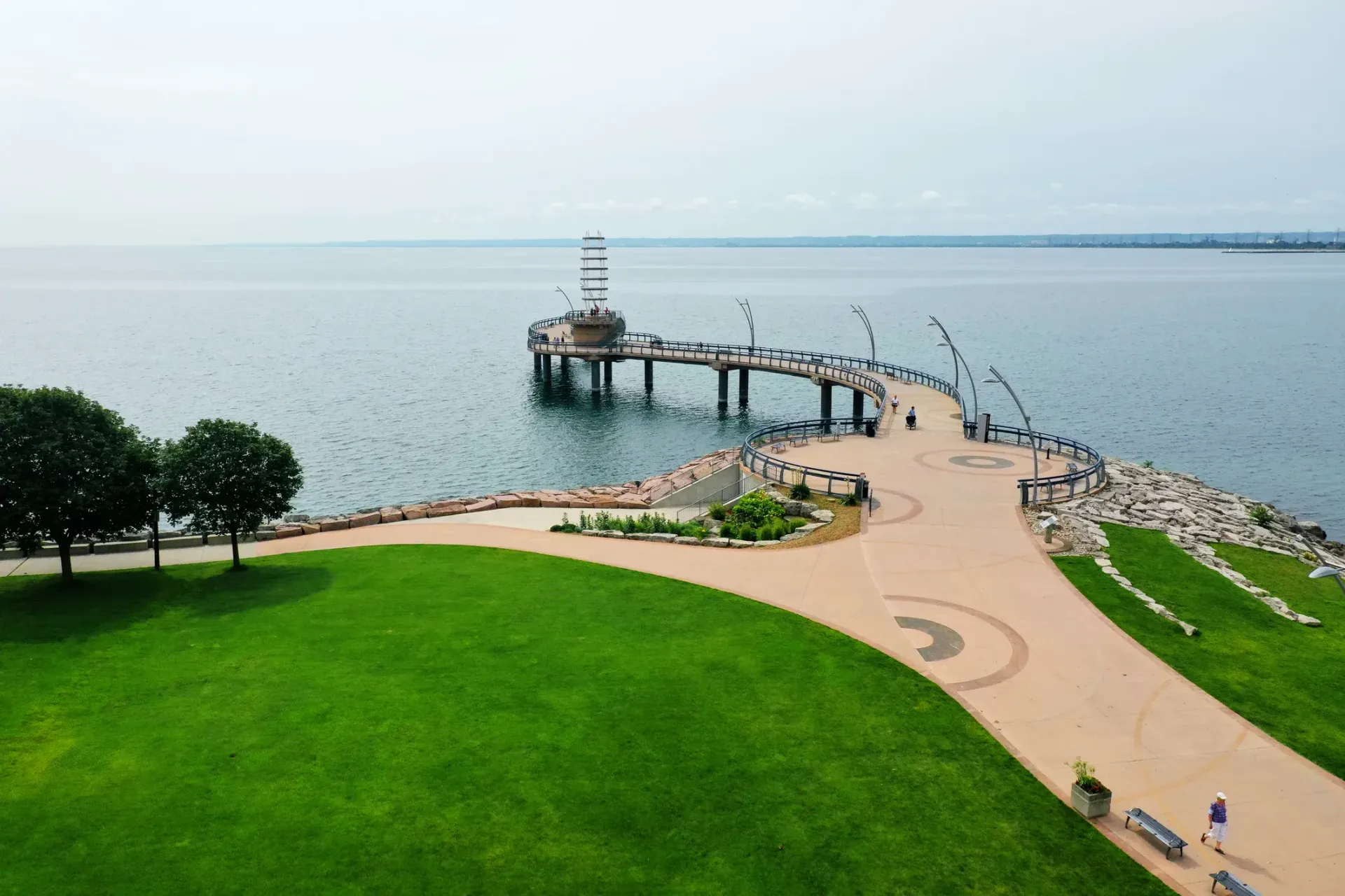 An aerial view of a pier overlooking a body of water.