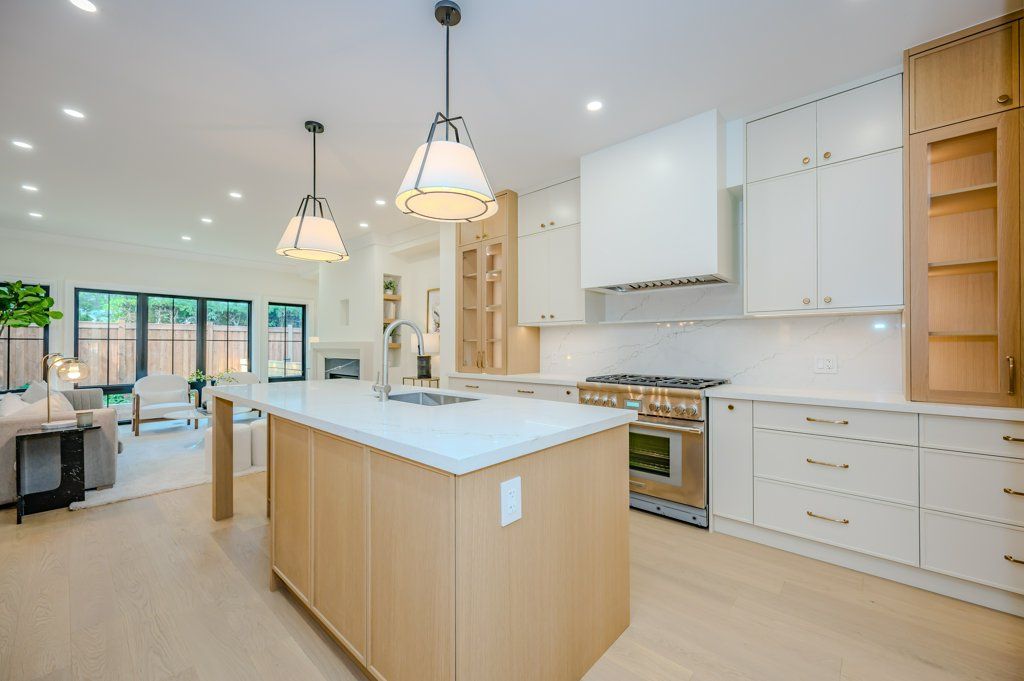 There is a large island in the middle of the kitchen.
